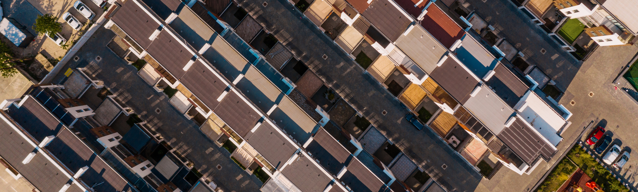top-view-town-houses-texture-2026-03-10-03-17-21-utc-scaled_2556x769_acf_cropped